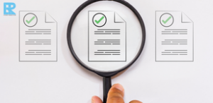 Magnifying glass focused on certified documents with checkmarks, representing official translation services.